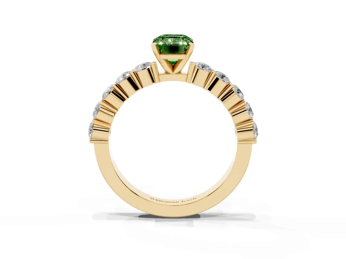 Fancy Green Emerald Cut Diamond Solitaire Ring with Shared Prong Round Side Stones Yellow gold