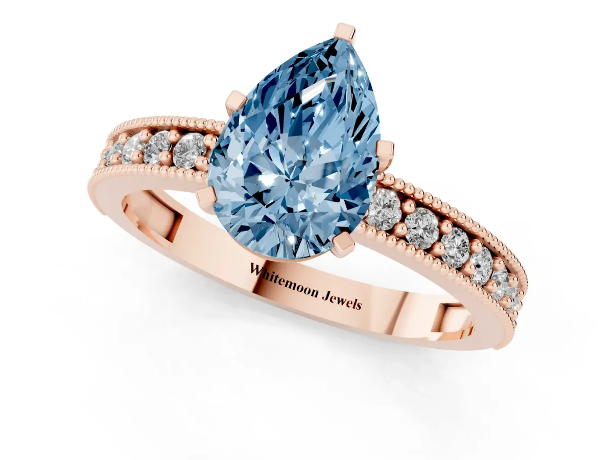 Fancy Blue Pear Cut Diamond Milgrain Pavé Engagement Ring with Four-Prong Setting Rose gold