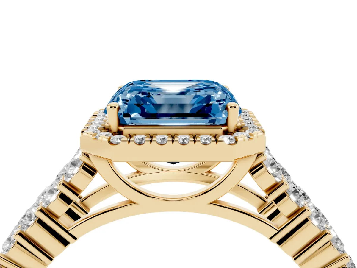 Fancy Blue Asscher Cut Diamond Halo Engagement Ring with Triple Row Round Pavé Band and Prong Setting Yellow gold