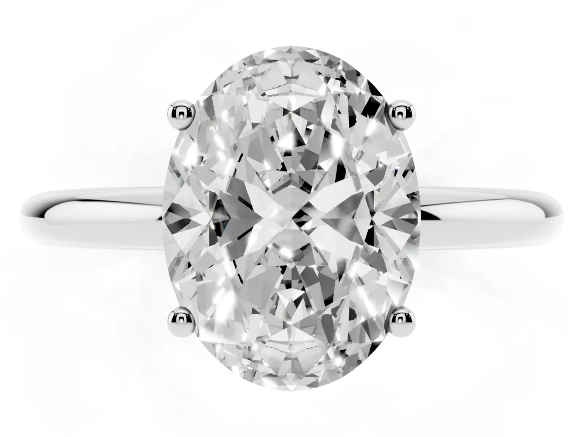 Oval Cut Cut Solitaire Engagement Ring with Four-Prong Setting and Classic Band Silver