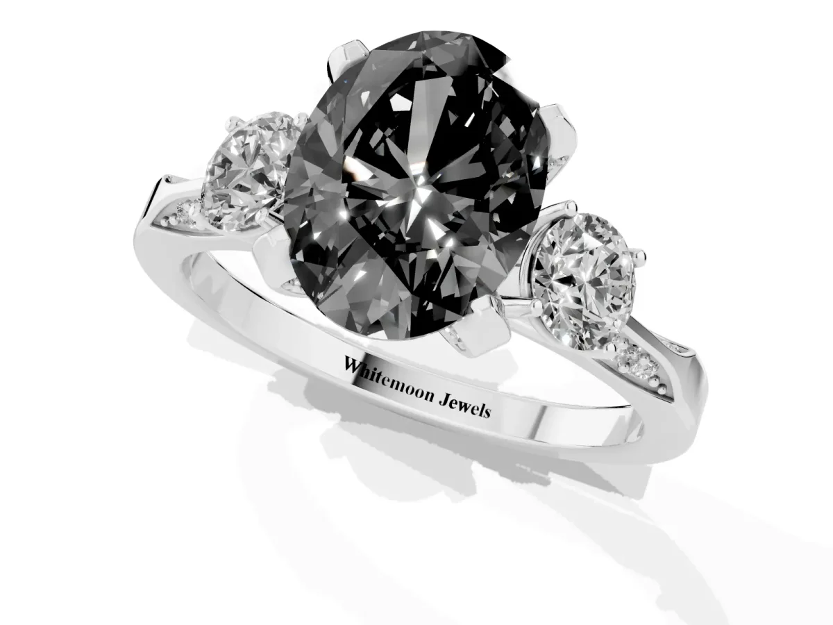 Fancy Black Oval Cut Brilliant Three-Stone Diamond Ring with Pavé Band and Four-Prong Setting White gold