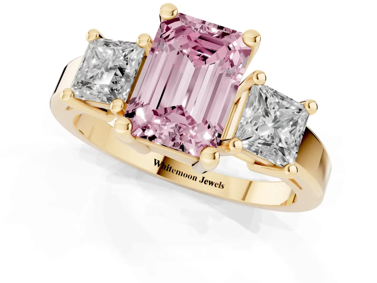 Fancy Pink Three-Stone Emerald Cut Cut Solitaire Ring with Prong Setting Yellow gold
