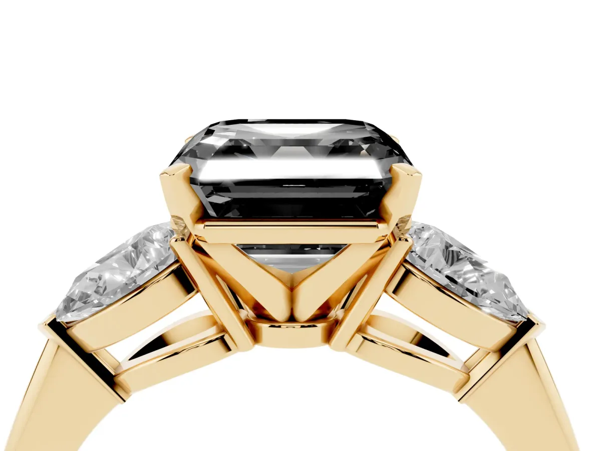 Fancy Black Three-Stone Asscher Cut Diamond Ring with Pear Side Stones and Four-Prong Setting Yellow gold