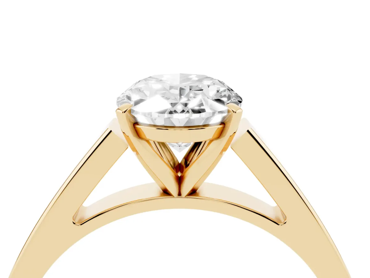 Oval Cut Solitaire Engagement Ring with Four-Prong Setting and Tapered Band Yellow gold
