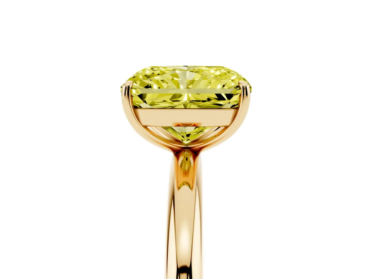 Fancy Yellow Radiant Cut Solitaire Diamond Ring with Four-Prong Setting on a Plain Band Yellow gold