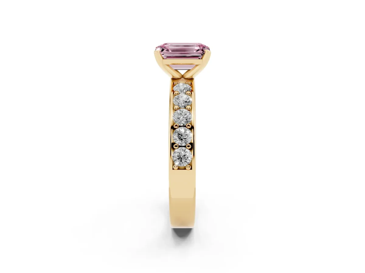 Fancy Pink Emerald Cut Diamond Engagement Ring with Channel Set Round Band and Prong Setting Yellow gold