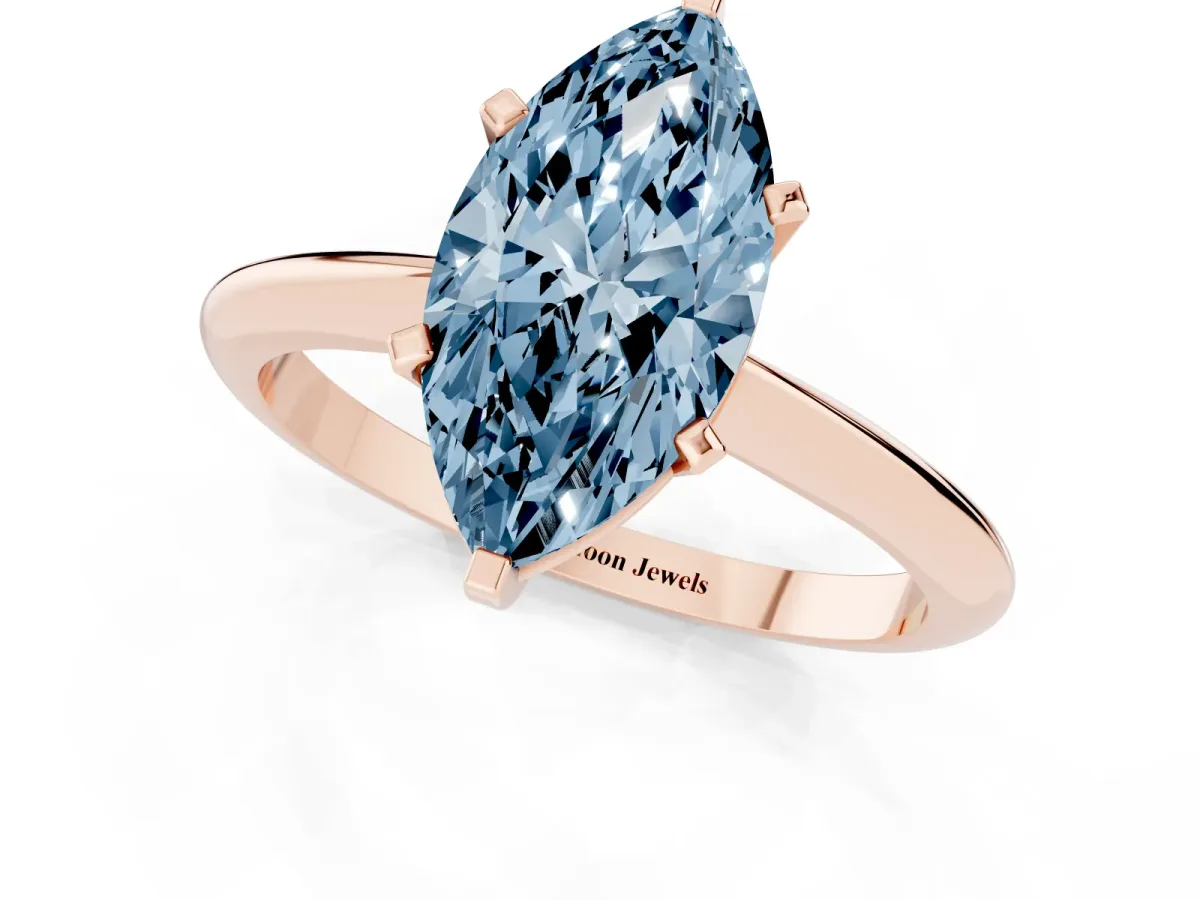 Fancy Blue Marquise Cut Cut Solitaire Ring with Four-Prong Setting on a Classic Band Rose gold