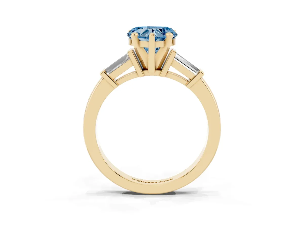 Fancy Blue Heart Cut Cut Diamond Solitaire Ring with Tapered Baguette Accents and Four-Prong Setting Yellow gold