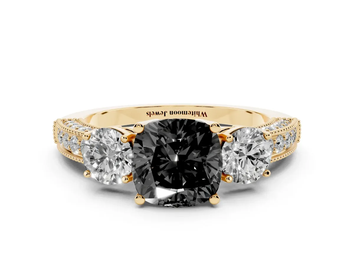 Fancy Black Cushion Cut Three-Stone Diamond Ring with Pavé Band and Four-Prong Setting Yellow gold