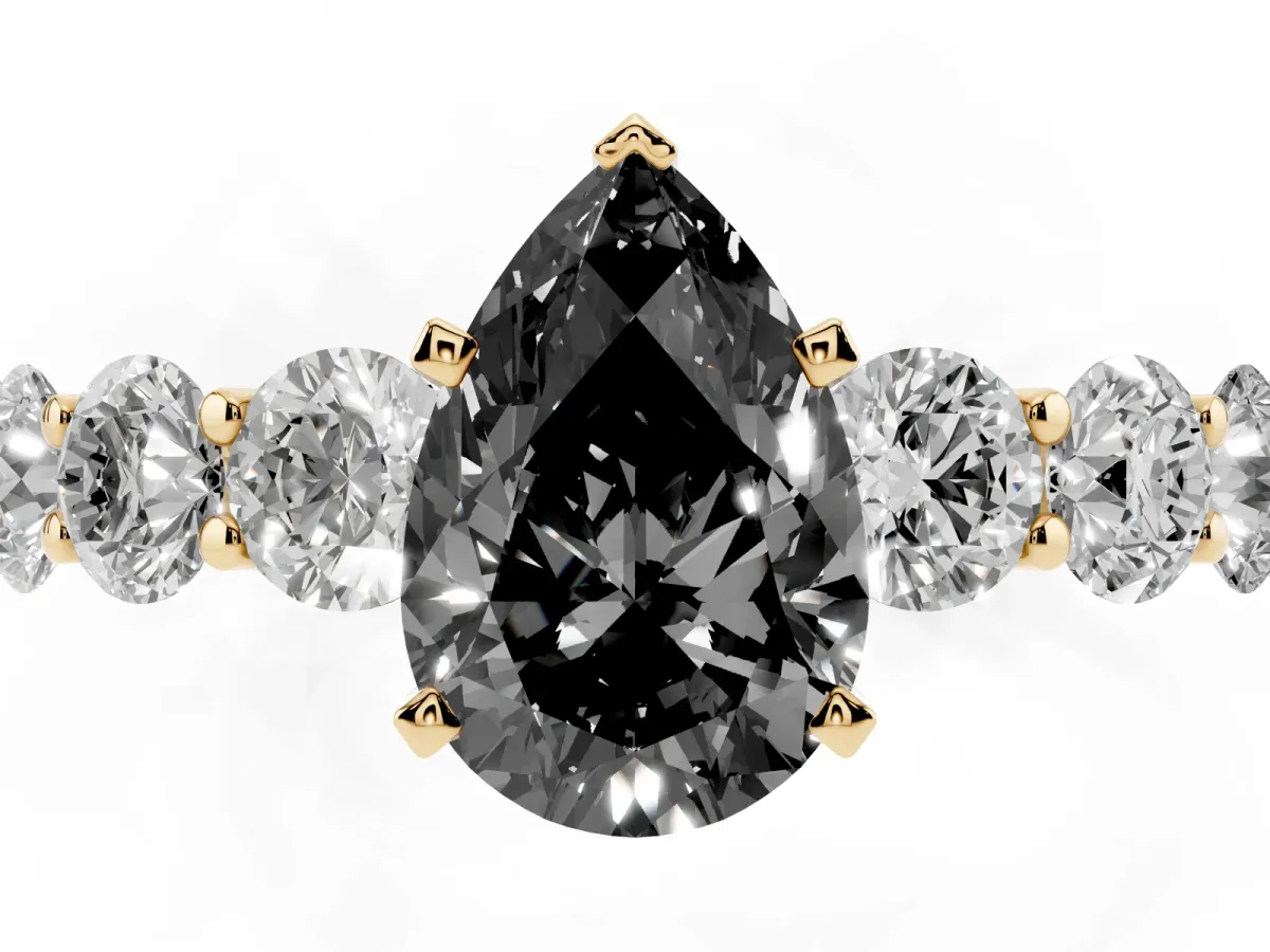 Fancy Black Pear Cut Diamond Prong Setting with Side Stones on a Pave Band Yellow gold