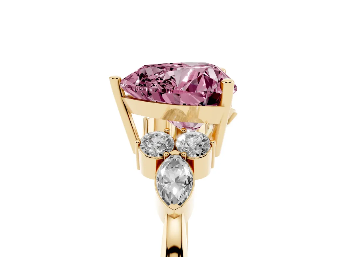 Fancy Pink Heart Cut Brilliant Diamond Solitaire Ring with Pear Side Stones and Four-Prong Setting Yellow gold