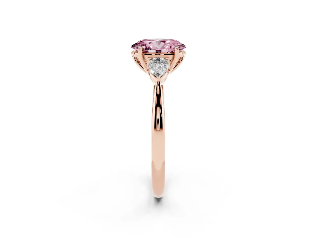 Fancy Pink Three-Stone Oval Cut Brilliant Diamond Solitaire Ring with Tapered Band and Four-Prong Setting Rose gold