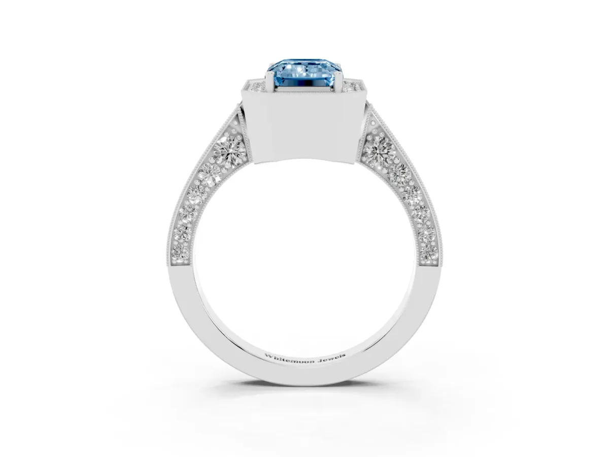 Fancy Blue Emerald Cut Halo Diamond Engagement Ring with Split Shank Band and Four-Prong Setting Silver