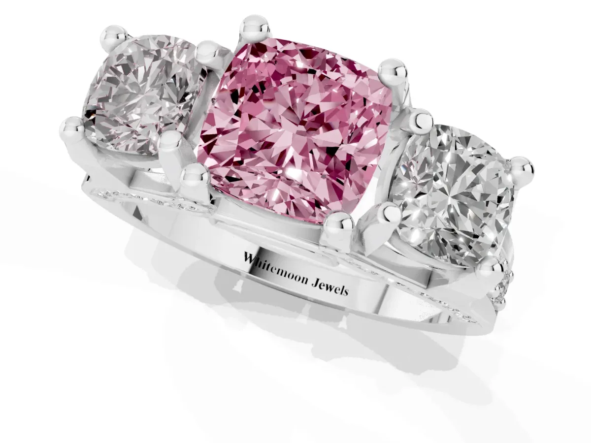 Fancy Pink Cushion Cut Diamond Three-Stone Ring with Channel Set Band and Four-Prong Setting Platinum