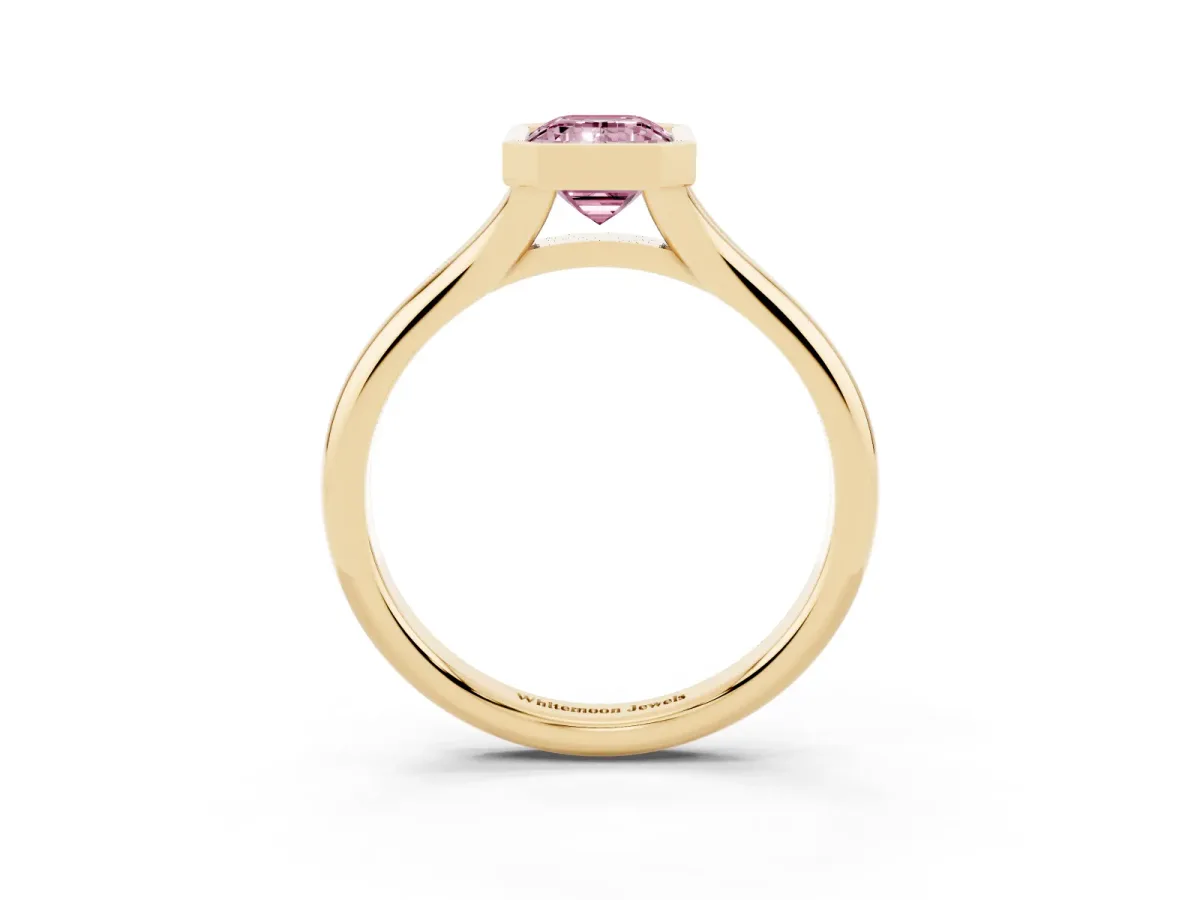 Fancy Pink Bezel Set Emerald Cut Solitaire Diamond Ring with Smooth Band Yellow gold