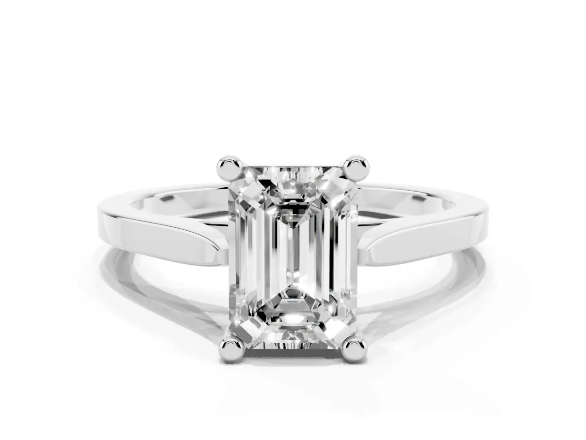 Emerald Cut Solitaire Diamond Ring with Four-Prong Setting and Tapered Band White gold