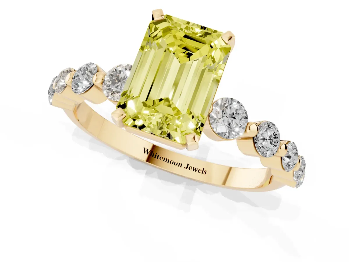 Fancy Yellow Emerald Cut Solitaire Diamond Ring with Pave Band and Four-Prong Setting Yellow gold