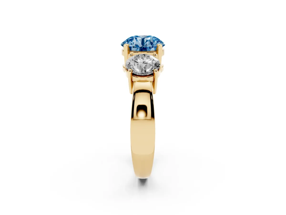 Fancy Blue Three-Stone Round Cut Diamond Ring with Round Side Stones, Classic Band, and Four-Prong Setting Yellow gold