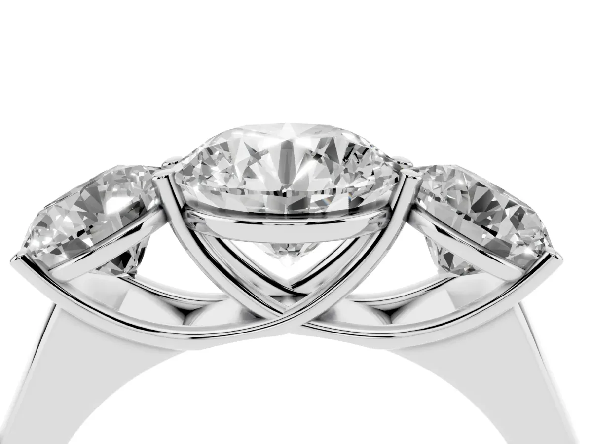 Round Cut Three-Stone Diamond Ring with Prong Setting on a Classic Band Platinum