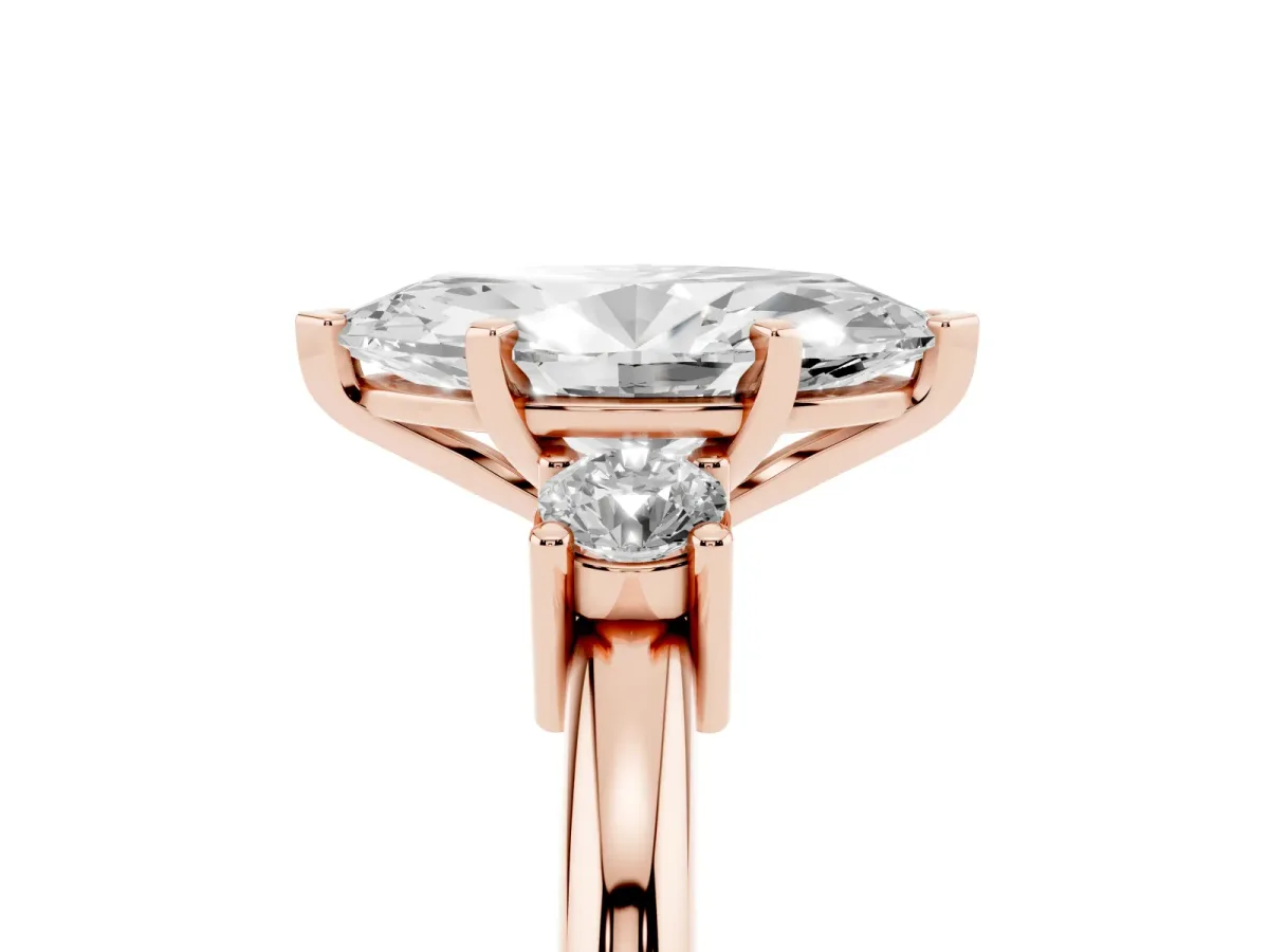 Three-Stone Marquise Cut Cut Diamond Solitaire with Prong Setting and Classic Band Rose gold