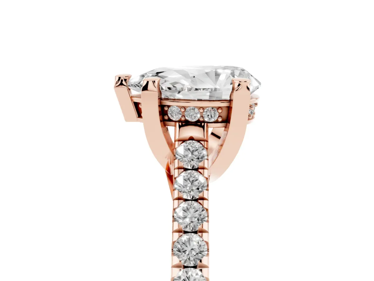 Pear Cut Brilliant Diamond Solitaire with Pavé Band and Four-Prong Setting Rose gold