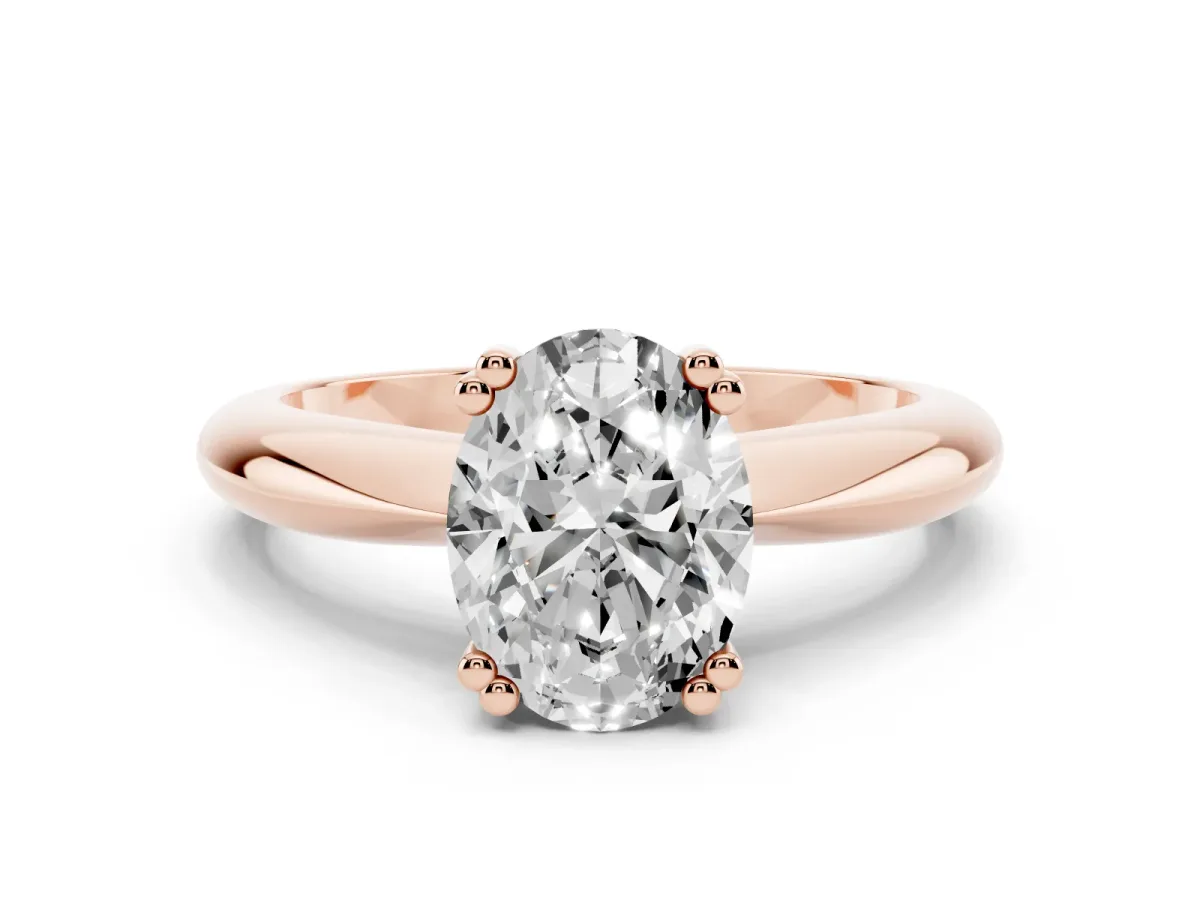 Oval Cut Cut Solitaire Engagement Ring with Tapered Band and Four-Prong Setting Rose gold