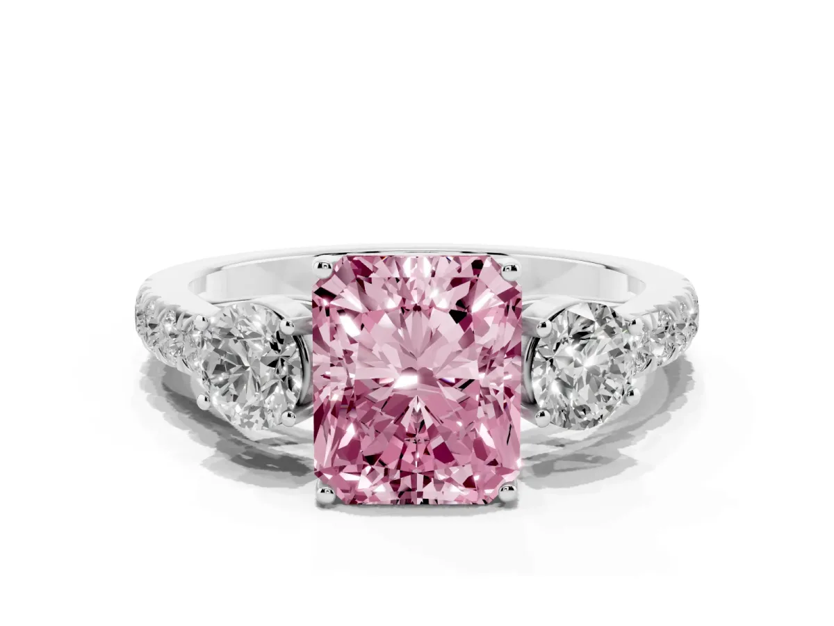 Fancy Pink Radiant Cut Cut Diamond Three-Stone Ring with Round Side Stones and Pavé Band Silver