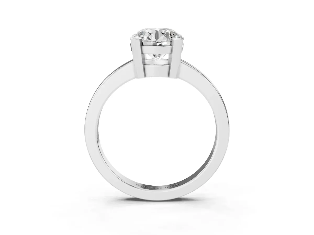 Round Cut Cut Solitaire Ring with Four-Prong Setting and Classic Band Silver