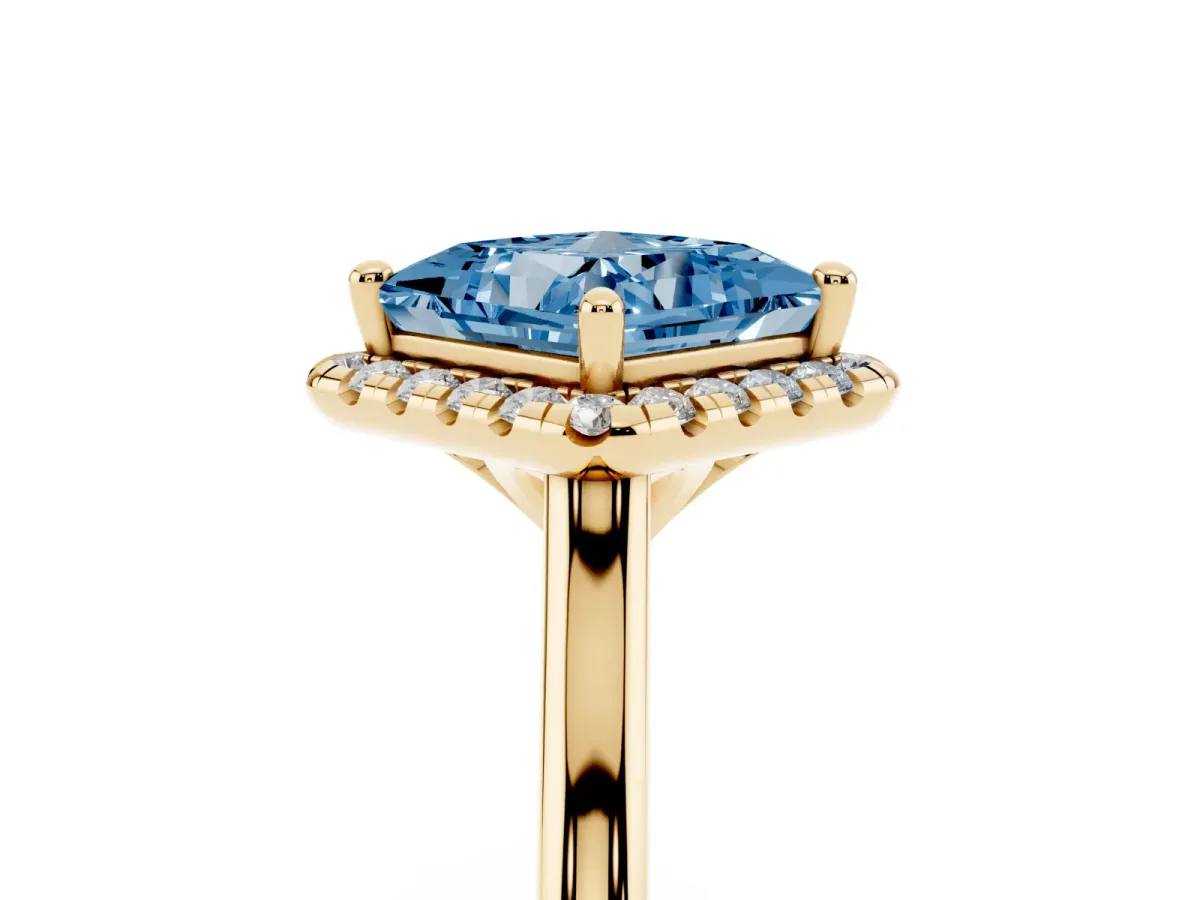Fancy Blue Princess Cut Halo Round Diamond Solitaire Engagement Ring with Pave Band and Four-Prong Setting Yellow gold
