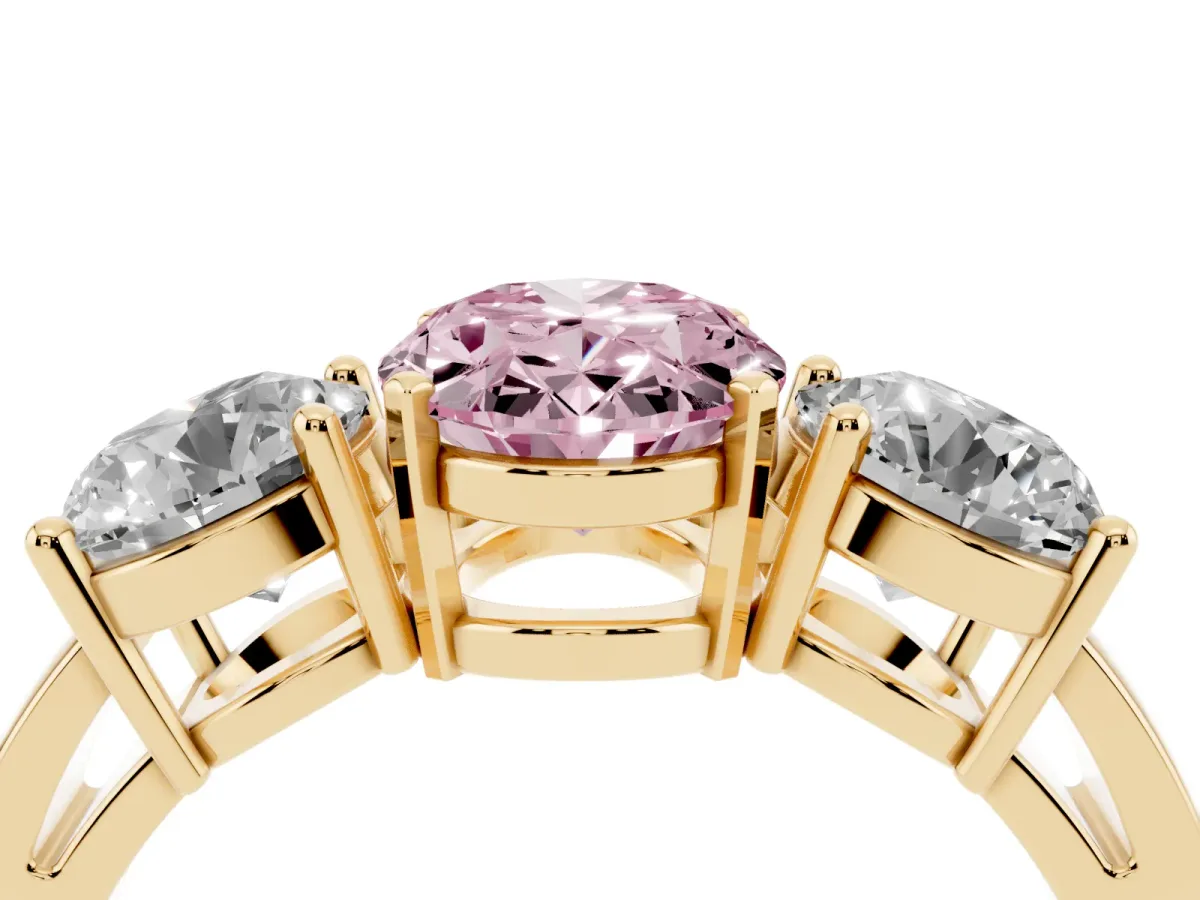 Fancy Pink Three-Stone Oval Cut Diamond Ring with Round Side Stones, Classic Band, and Four-Prong Setting Yellow gold