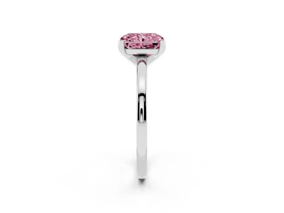 Fancy Pink Radiant Cut Solitaire Diamond Engagement Ring with Four-Prong Setting on a Classic Band Silver