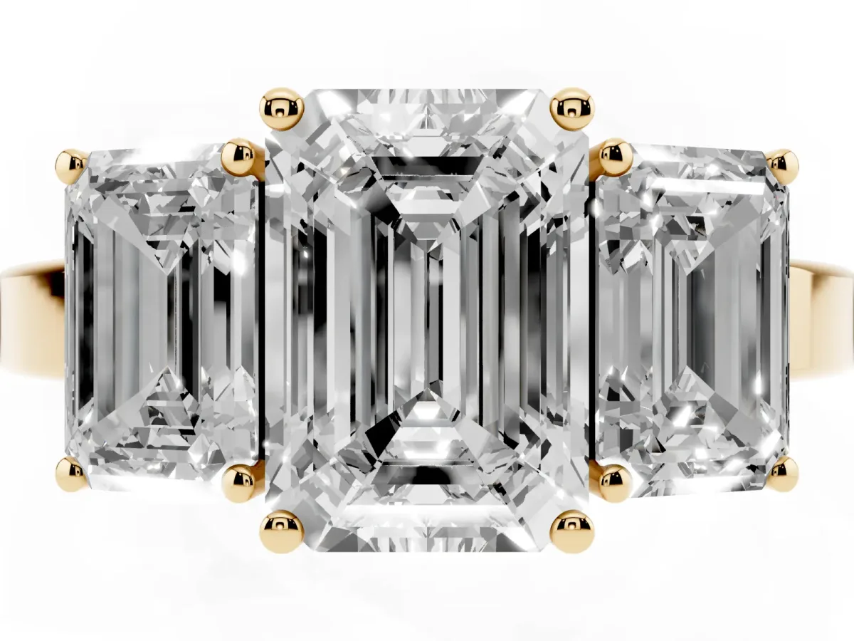 Three-Stone Emerald Cut Cut Diamond Engagement Ring with Flat Band and Four-Prong Setting Yellow gold