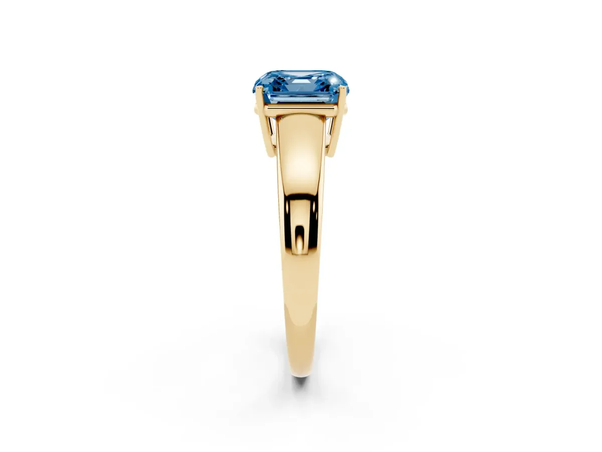 Fancy Blue Asscher Cut Solitaire Diamond Ring with Tapered Band and Four-Prong Setting Yellow gold