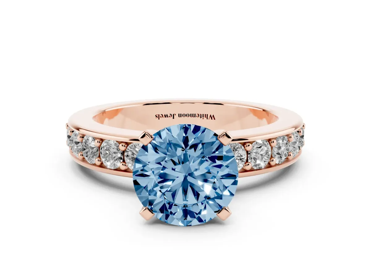 Fancy Blue Round Cut Diamond Engagement Ring with Channel Set Round Band and Prong Setting Rose gold