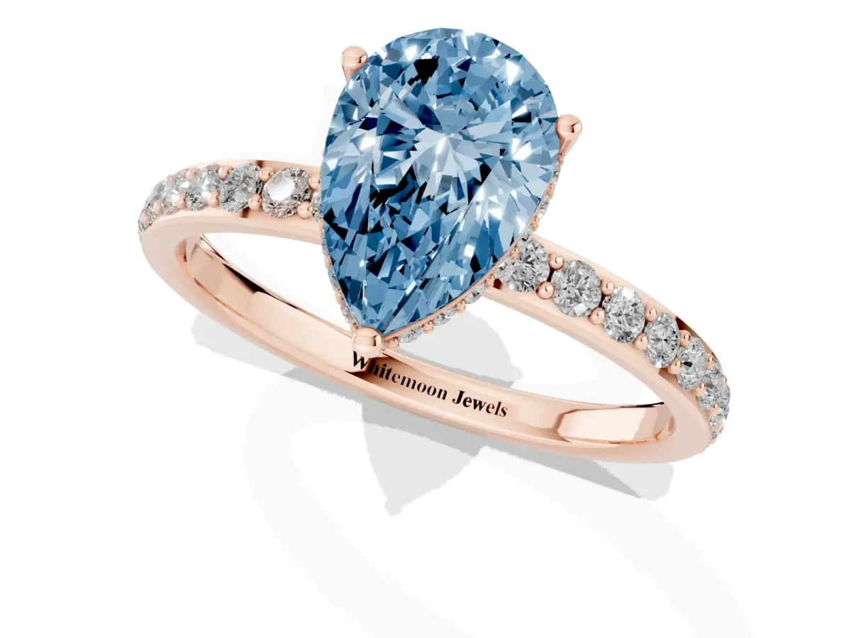 Fancy Blue Pear Cut Diamond Solitaire Ring with Pavé Band and Hidden Halo Rose gold