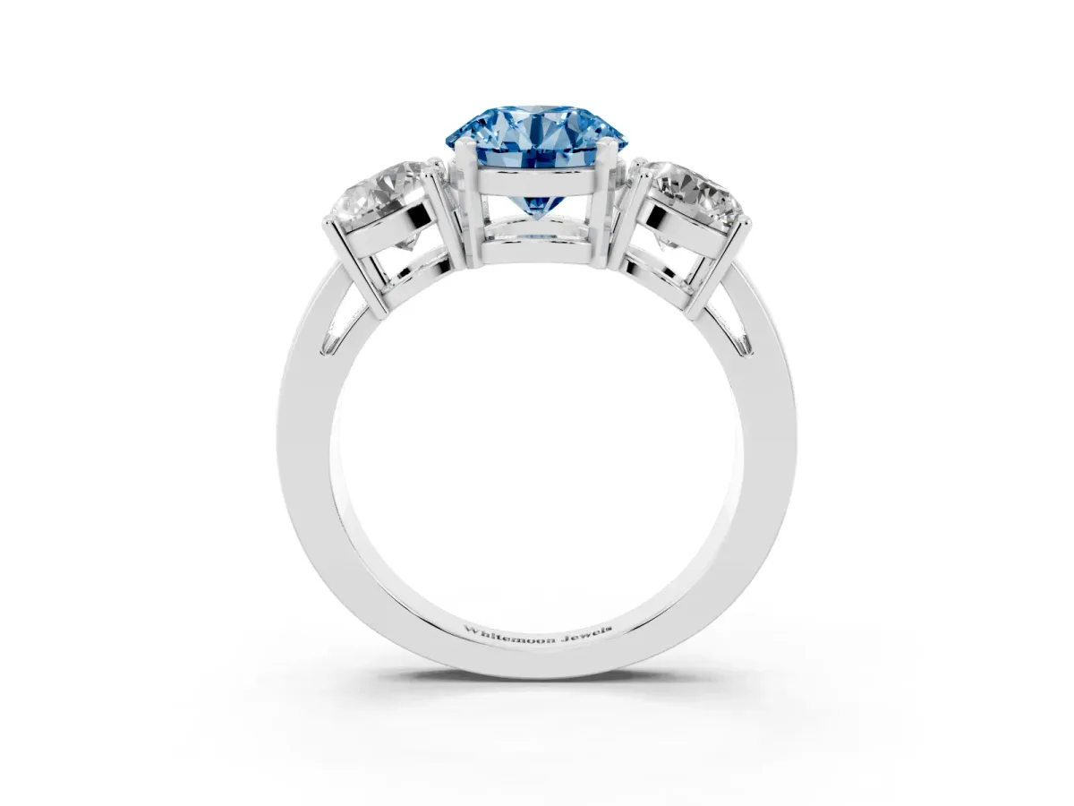 Fancy Blue Three-Stone Round Cut Diamond Ring with Round Side Stones, Classic Band, and Four-Prong Setting White gold