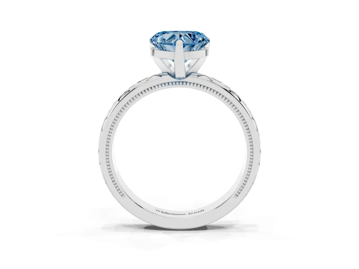 Fancy Blue Heart Cut Solitaire Engagement Ring with Scrollwork Band and Four-Prong Setting White gold