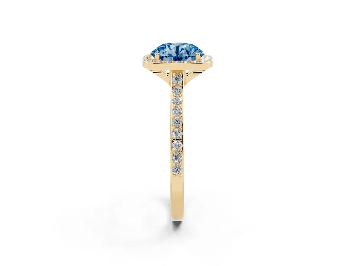 Fancy Blue Round Cut Diamond Halo Engagement Ring with Round Pavé Shoulders and Prong Setting Yellow gold