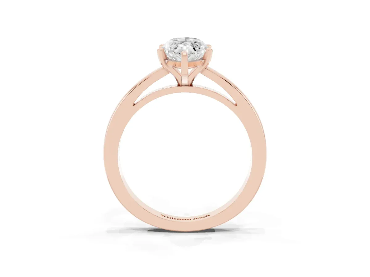 Marquise Cut Solitaire Diamond Engagement Ring with Four-Prong Setting on a Classic Band Rose gold