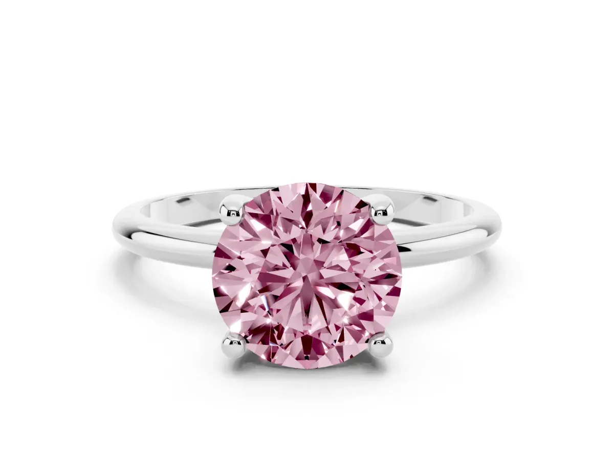 Fancy Pink Round Cut Solitaire Diamond Ring with 4-Prong Setting on a Classic Band Platinum