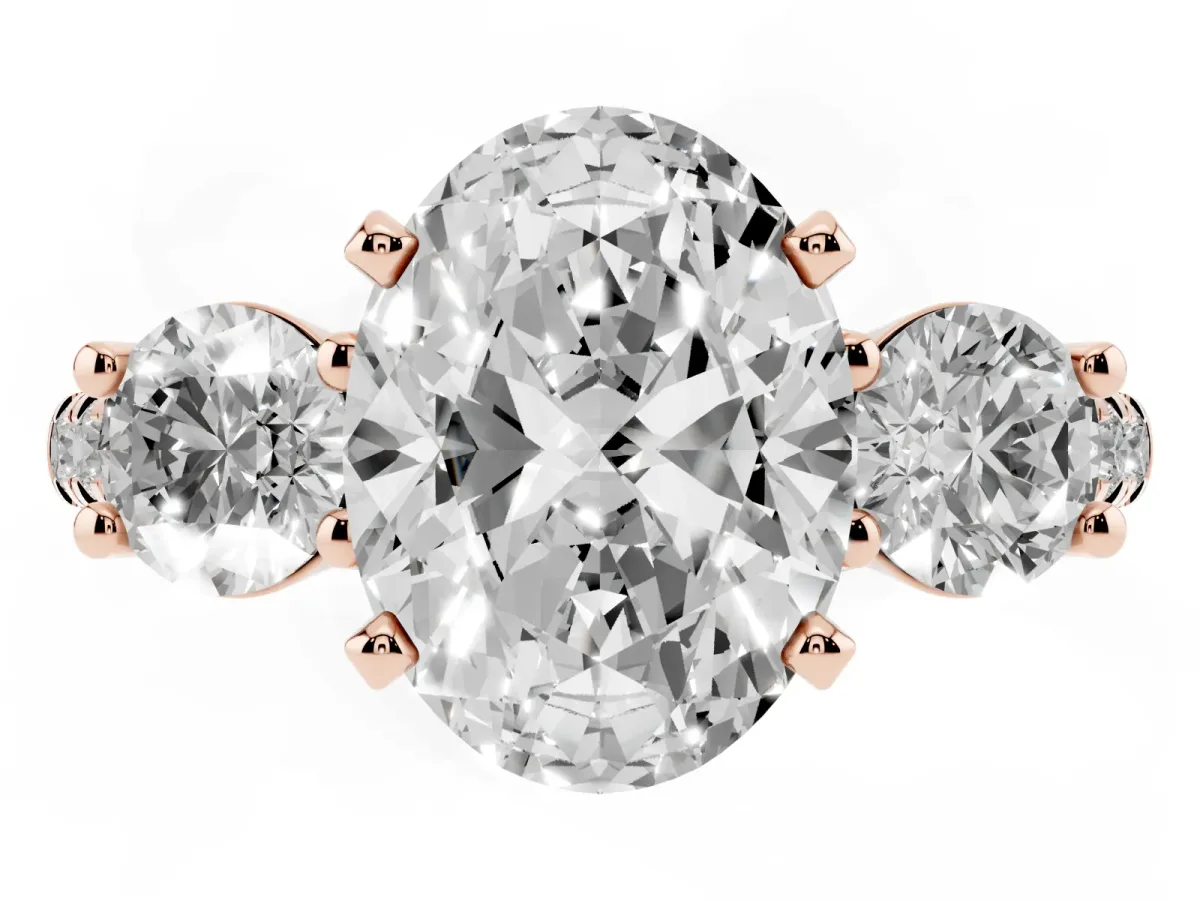Three-Stone Oval Cut Diamond Pavé Band with Four-Prong Setting Rose gold