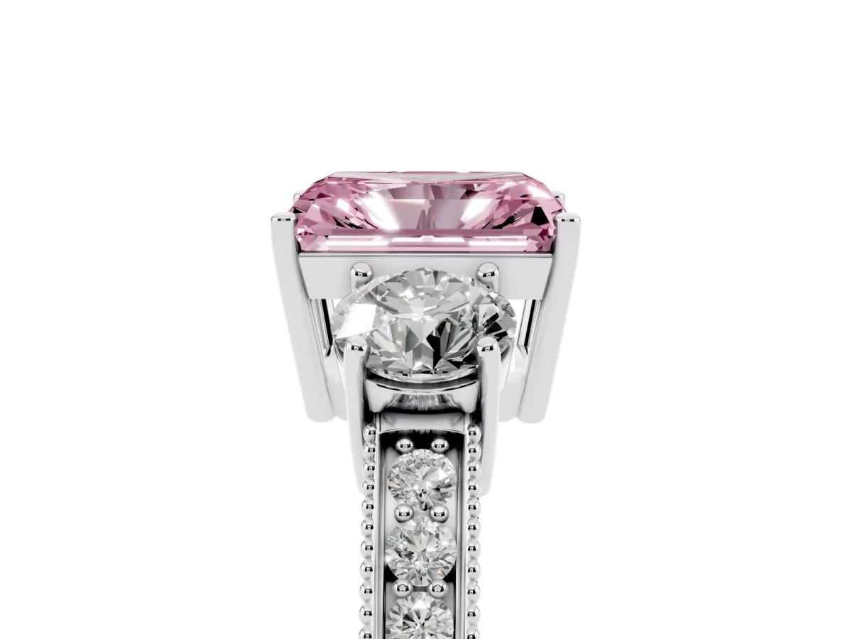 Fancy Pink Radiant Cut Three-Stone Diamond Ring with Pavé Band and Four-Prong Setting Silver