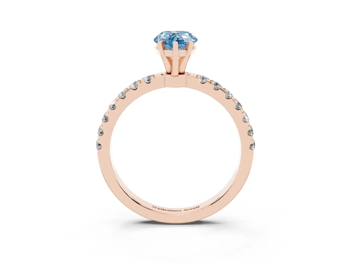 Fancy Blue Pear Cut Diamond Solitaire Ring with Pavé Accents and Four-Prong Setting Rose gold