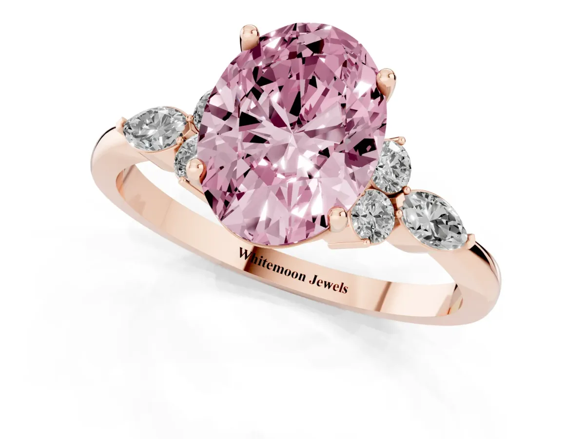 Fancy Pink Oval Cut Brilliant Diamond Solitaire Ring with Pear Side Stones and Four-Prong Setting Rose gold