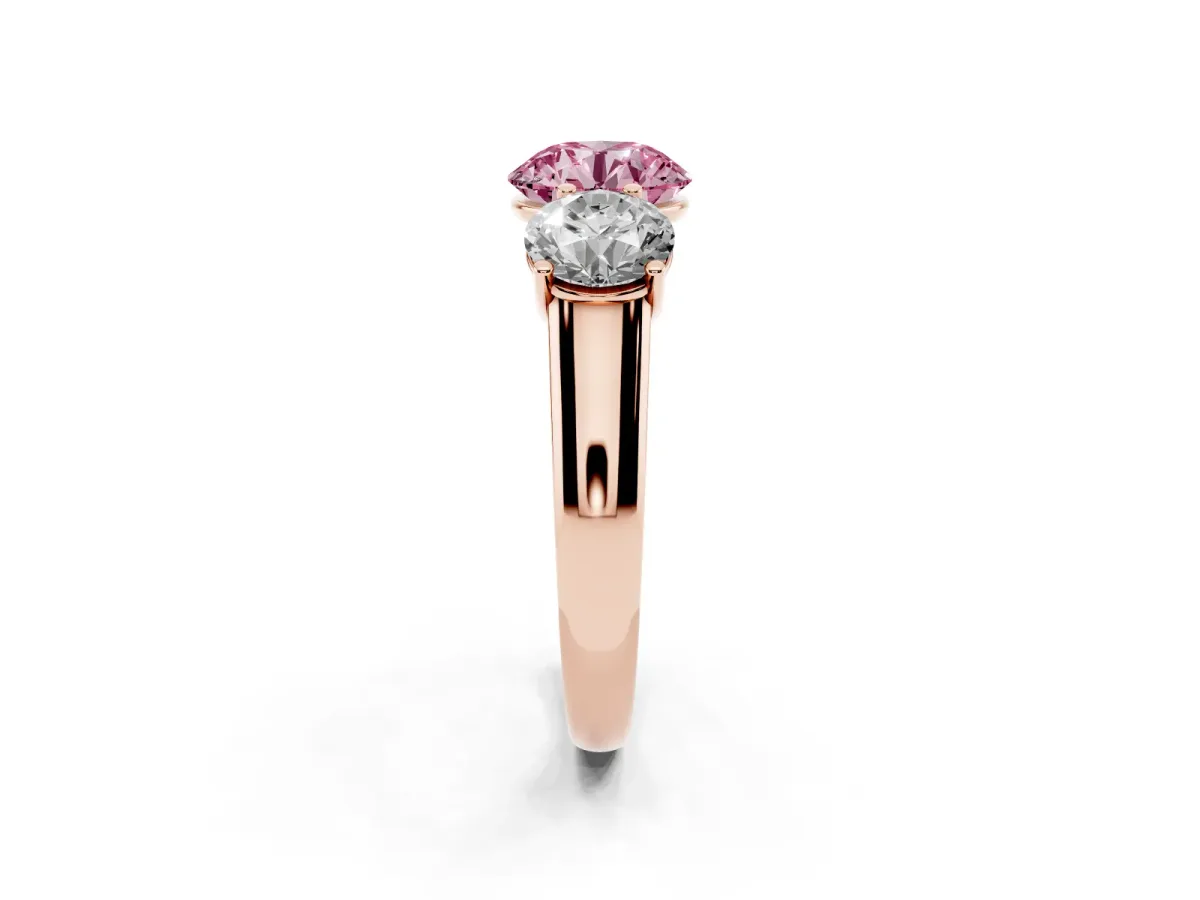 Fancy Pink Round Cut Three-Stone Diamond Ring with Prong Setting on a Classic Band Rose gold