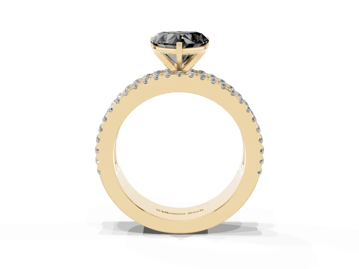 Fancy Black Heart Cut Diamond Solitaire Ring with Pavé and Channel Set Band Yellow gold