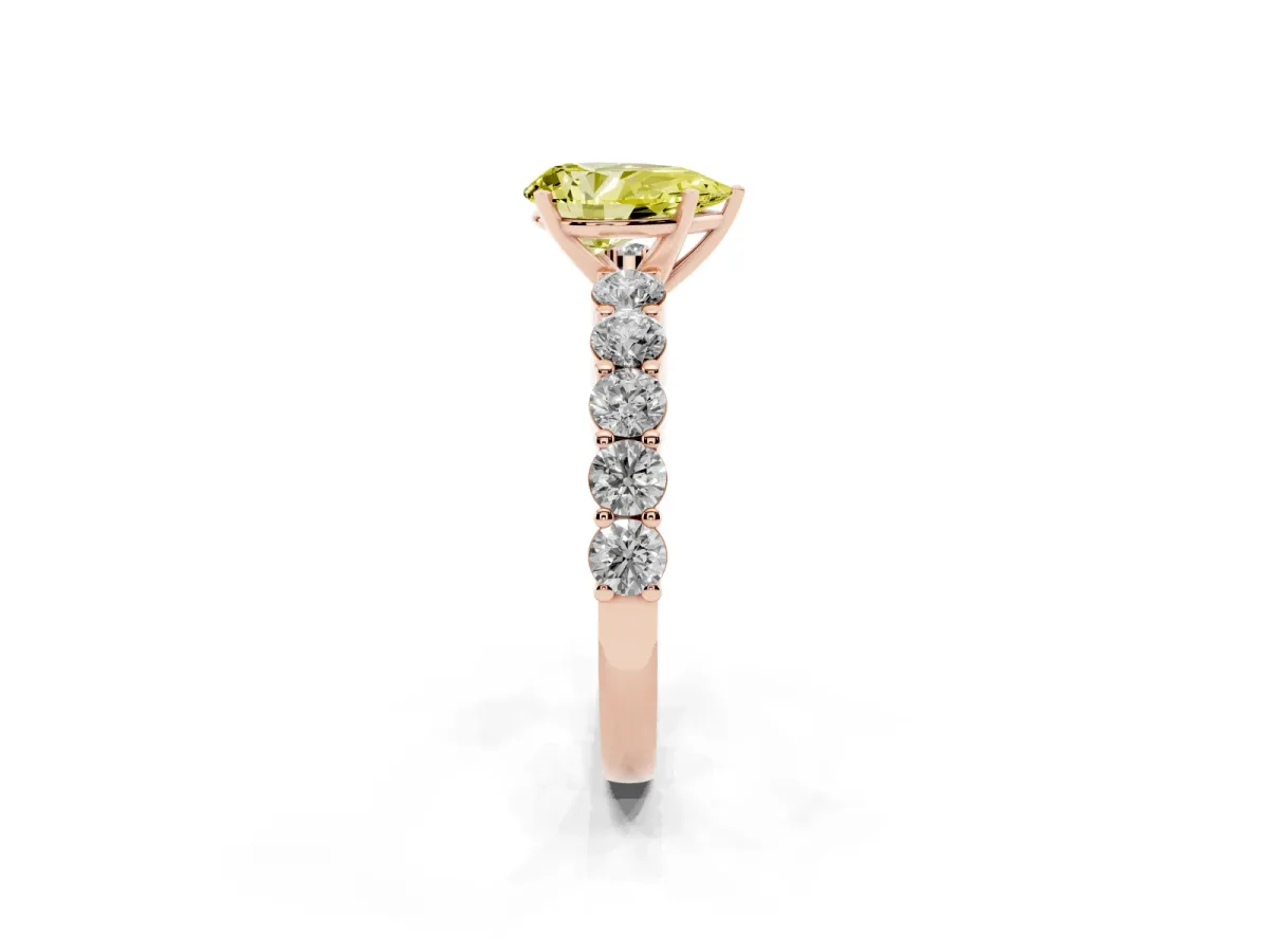Fancy Yellow Pear Cut Diamond Solitaire Ring with Shared Prong Round Side Stones Rose gold
