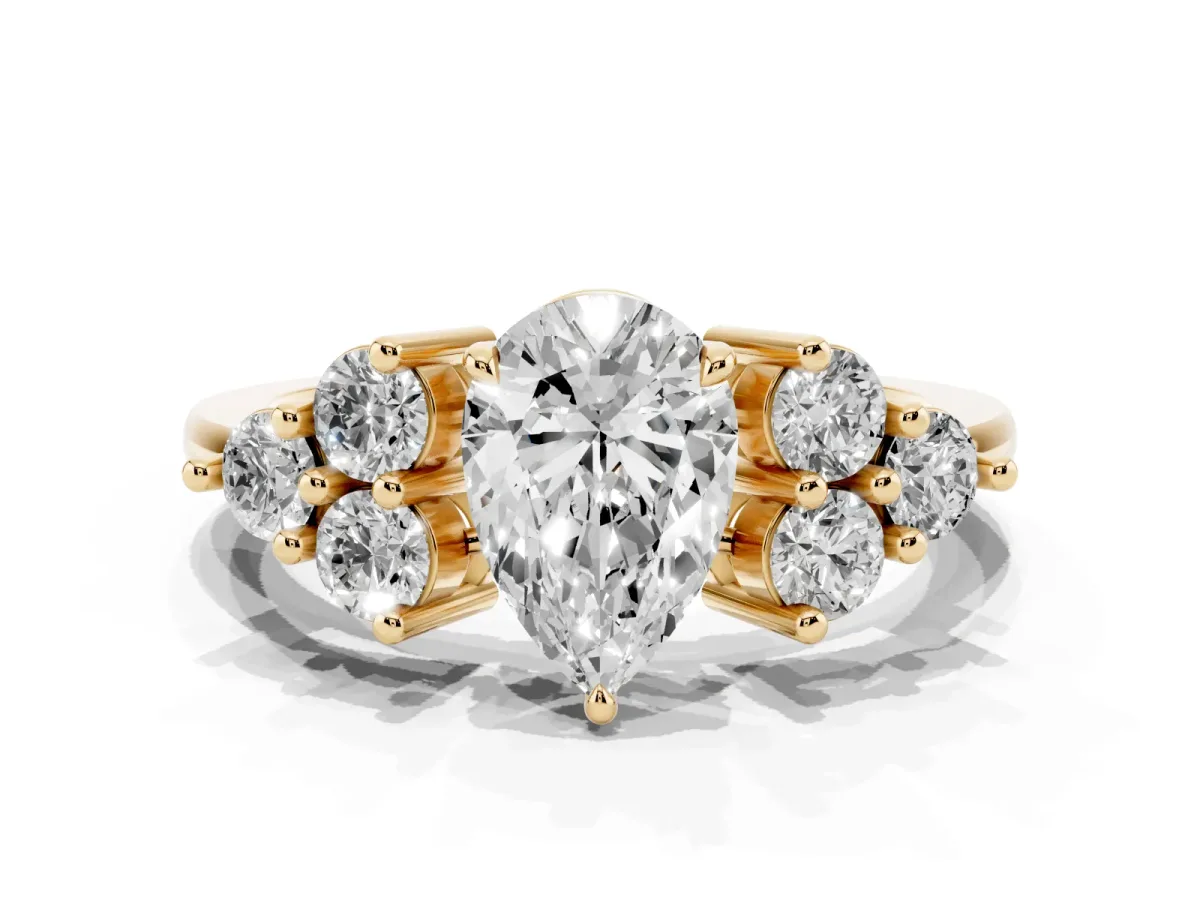 Pear Cut Brilliant Diamond Cluster Accent Solitaire Ring with Prong Setting Yellow gold