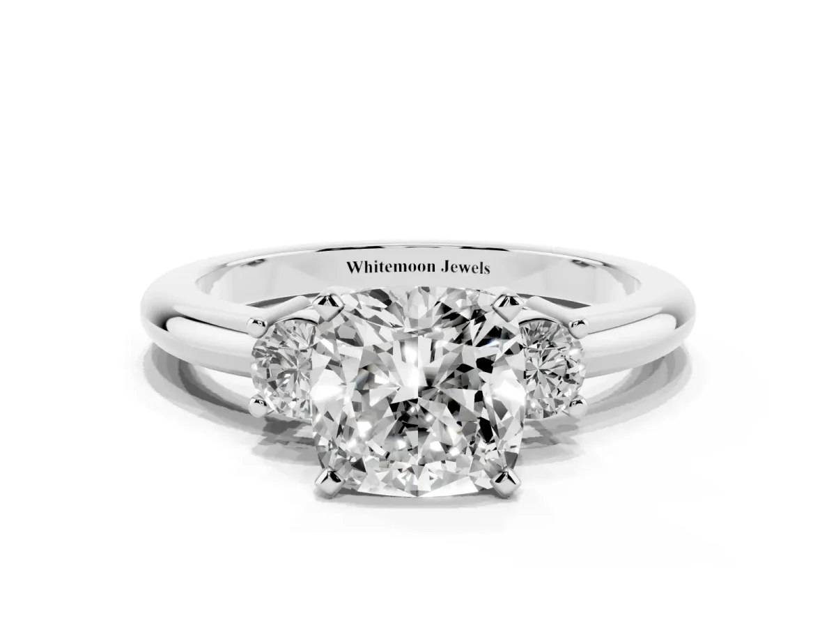 Three-Stone Cushion Cut Cut Diamond Solitaire with Prong Setting and Classic Band Platinum