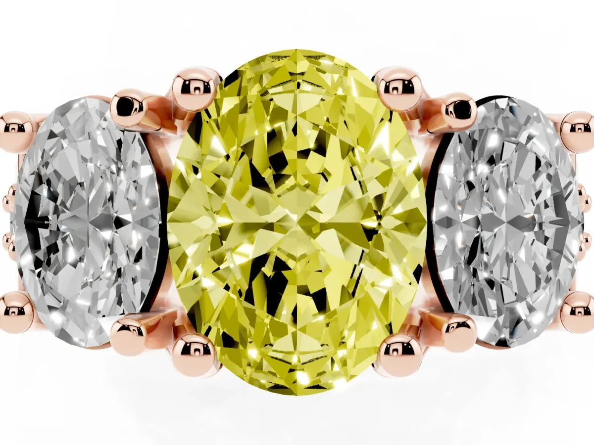 Fancy Yellow Oval Cut Diamond Three-Stone Ring with Channel Set Band and Four-Prong Setting Rose gold